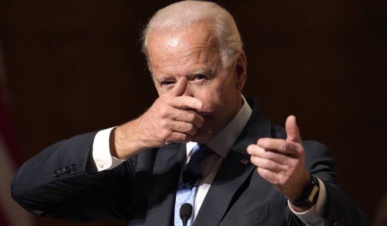 Former Vice President Joe Biden mimics shooting a gun as he speaks at the Chuck Hagel Forum in Global Leadership, on the campus of the University of Nebraska-Omaha, in Omaha, Neb., Thursday, Feb. 28, 2019. (AP Photo/Nati Harnik)