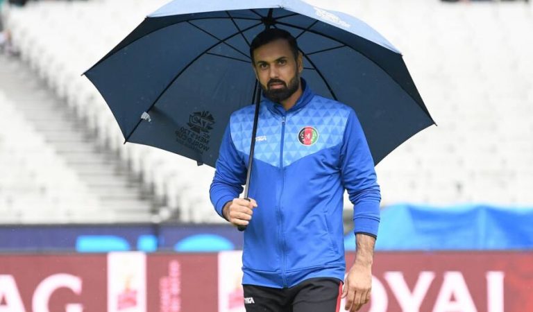 MELBOURNE, AUSTRALIA - OCTOBER 28: Mohammad Nabi of Afghanistan looks on after the match was abandoned due to rain the ICC Men's T20 World Cup match between Afghanistan and Ireland at Melbourne Cricket Ground on October 28, 2022 in Melbourne, Australia. (Photo by Morgan Hancock - ICC/ICC via Getty Images)