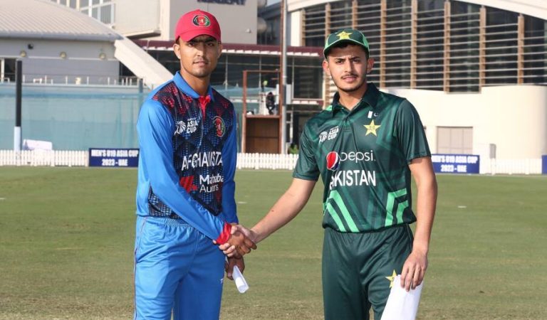 Naseer Khan Maroof Khil of Afghanistan and Mirza Saad Baig of Pakistan pose after the toss  team during the start of  Men's U19 Asia Cup 2023 Group A match between Afghanistan and Pakistan at the ICC Academy, Dubai, UAE  on the 12th December 2023.