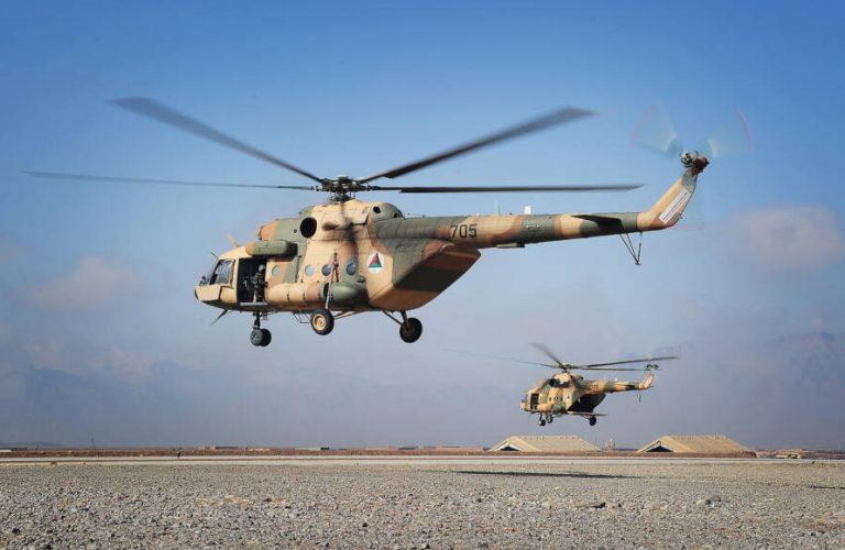 Mi-17 helicopters operated by the 2nd Wing of the Afghan National Army Air Force take off at Multinational Base Tarin Kowt in Uruzgan province, Afghanistan, Feb. 23, 2013. (U.S. Army photo/Released)