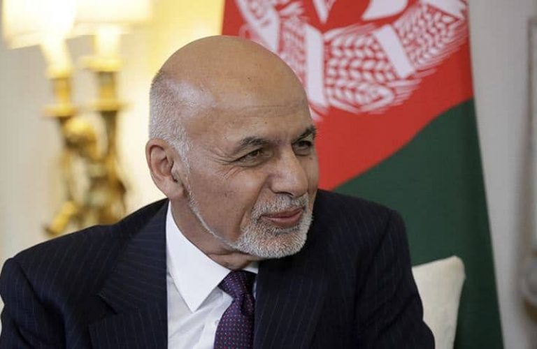 FILE - In this June 17, 2019 file photo, Afghanistan's President Ashraf Ghani speaks with British Prime Minister Theresa May at the start of their meeting inside 10 Downing Street in London. Afghanistan's election commission said the president has won a second term, earning 50.64% of a preliminary vote count announced Sunday, Dec. 22, 2019, but his opponents can still challenge the result.(AP Photo/Matt Dunham, Pool, File)