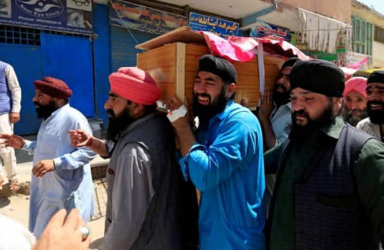 Afghan-Sikh-men-carry-the-coffin-of-one-of-the-victims-of-a-blast-in-Jalalabad-city-770x433