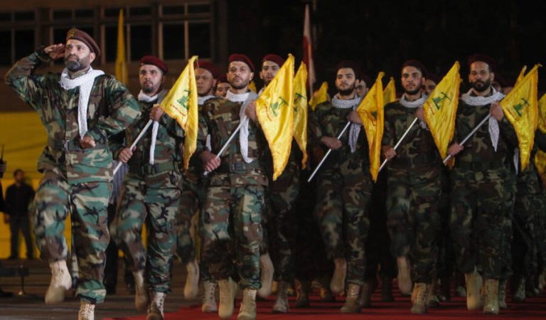 Members of Hezbollah march with party's flags during a rally marking al-Quds Day, (Jerusalem Day) in Beirut, Lebanon May 31, 2019. REUTERS/Aziz Taher/File Photo