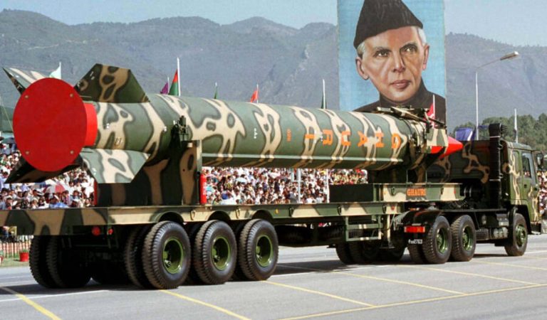 FILE PHOTO 23MAR99 - An army vehicle carrying the long range surface-to-surface "Ghauri" missile passes a portrait of the nation's founder Mohammad Ali Jinnah, during a military parade to mark Pakistan day in Islamabad in this March 23 file photo. Pakistan was preparing to test a missile in response to India's weekend firing of its Agni ballistic missile, sources close to the test said on April 14. Pakistan's longest-range 1,500 kilometre (937 mile) Ghauri missile, a nuclear-capable ballistic missile, was first test-fired in April last year.

MP/JIR/JBP