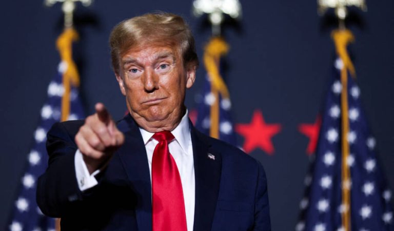 Republican presidential candidate and former U.S. President Donald Trump gestures at a campaign event ahead of the Republican presidential primary election in North Charleston, South Carolina, U.S. February 14, 2024. REUTERS/Sam Wolfe