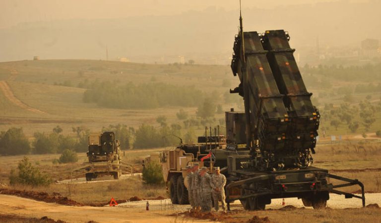 U.S. Service members stand by a Patriot missile battery in Gaziantep, Turkey, Feb. 4, 2013, during a visit from U.S. Deputy Secretary of Defense Ashton B. Carter, not shown. U.S. and NATO Patriot missile batteries and personnel deployed to Turkey in support of NATO?s commitment to defending Turkey?s security during a period of regional instability. (DoD photo by Glenn Fawcett/Released)