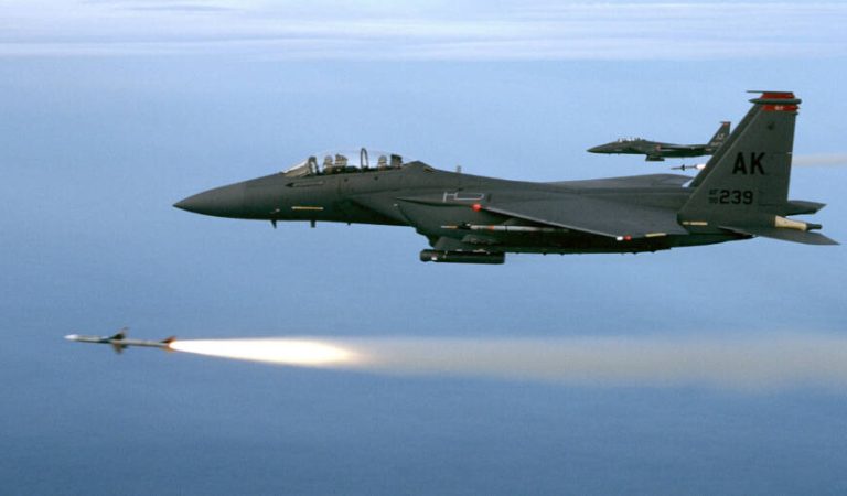 Two F-15E from the 90th Fighter Squadron, Elmedorf AFB, Alaska, fire a pair of AIM-7M's during a training mission. The mission took place over the Gulf of Mexico just off the coast of Florida. (U.S. Air Force Photo by Major Gary)