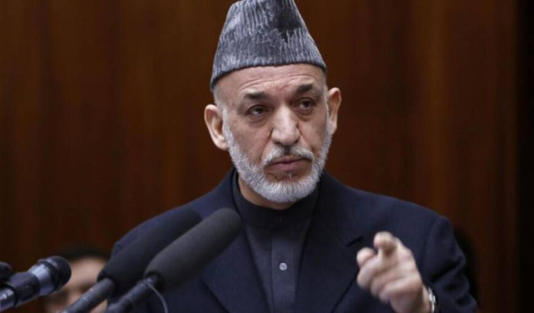 Afghanistan's President Hamid Karzai speaks during the opening ceremony of the third year of the Afghanistan parliament in Kabul in this March 6, 2013, file photo. Afghan President Hamid Karzai ratcheted up his criticism of the United States on March 10, 2013, marring a debut visit by the new U.S. defense secretary, Chuck Hagel, and highlighting tensions that could undermine Washington's strategy to wind down the unpopular war.   REUTERS/Mohammad Ismail/Files (AFGHANISTAN - Tags: POLITICS)