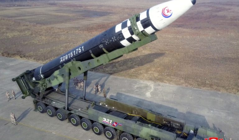 An intercontinental ballistic missile (ICBM) is prepared for launch in this undated photo released on November 19, 2022 by North Korea's Korean Central News Agency (KCNA). KCNA via REUTERS ATTENTION EDITORS - THIS IMAGE WAS PROVIDED BY A THIRD PARTY. NO THIRD PARTY SALES. SOUTH KOREA OUT. NO COMMERCIAL OR EDITORIAL SALES IN SOUTH KOREA. REUTERS IS UNABLE TO INDEPENDENTLY VERIFY THIS IMAGE.