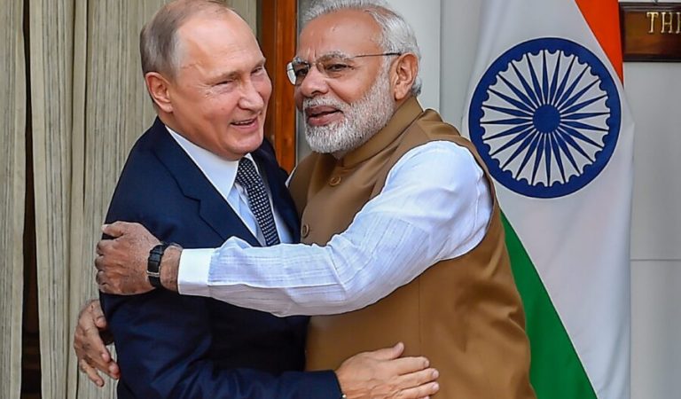 FILE-  Narendra Modi, Vladimir Putin