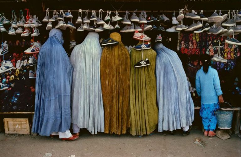 Afghan-Women-At-Shoe-Store-Kabul-Afghanistan1992-by-Steve-Mccurry-c04894