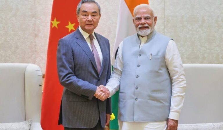 Chinese Foreign Minister and Narendra Modi
