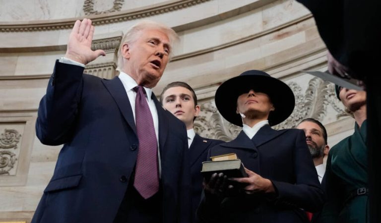 Donald Trump is sworn in as the 47th president of the United States by Chief Justice John Roberts as Melania Trump holds the Bible during the 60th Presidential Inauguration in the Rotunda of the U.S. Capitol in Washington, Monday, Jan. 20, 2025. (AP Photo/Morry Gash, Pool)