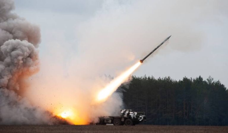 Launch of military missiles (rocket artillery) at the firing field during military exercise