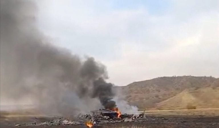 Smoke rises above wreckage at the site of the Turkish C-130 military cargo plane crash near the Azerbaijani border, in Sighnaghi municipality, Georgia, November 11, 2025, in this still image taken from video. TV.IMEDI/Handout via REUTERS  ATTENTION EDITORS - THIS IMAGE WAS PROVIDED BY A THIRD PARTY. NO RESALES. NO ARCHIVES. MANDATORY CREDIT. WATERMARK FROM SOURCE