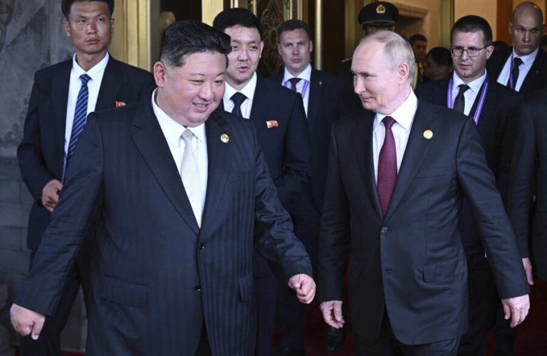 Vladimir Putin and Kim Jong Un