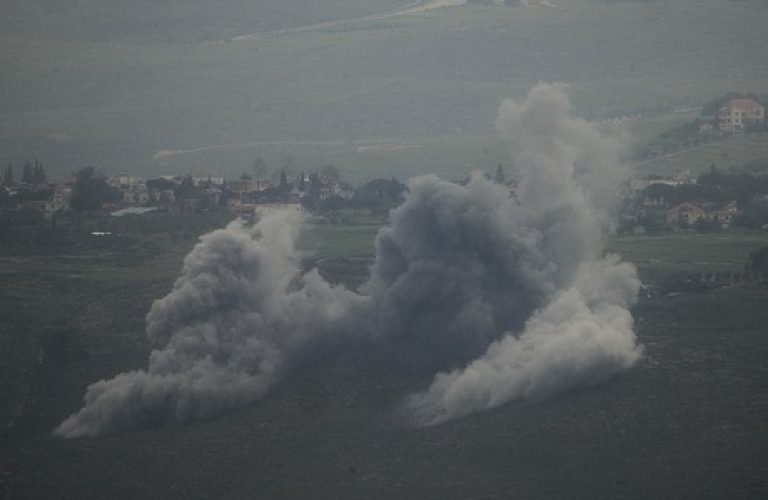 Smoke rises following an explosion in southern Lebanon, as seen from northern Israel, Tuesday, May 5, 2026. (AP Photo/Ariel Schalit)