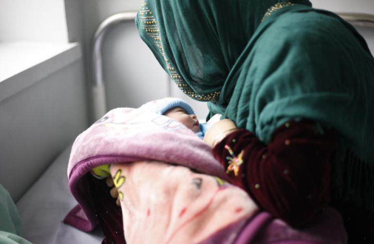 A mother breastfeeding her baby in Afghanistan 1