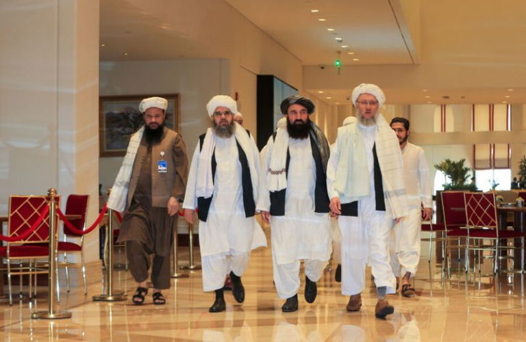 Abdul Salam Hanafi, member of the Taliban negotiating team and the Taliban delegation, arrive for Afghan peace talks in Doha, Qatar, August 12, 2021. REUTERS/Hussein Sayed