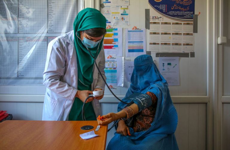 A doctor measures the blood pressure of a patient at the Kahdistan health clinic in Herat province, Afghanistan, on Oct. 7. The increasing presence of midwives across the country has started to play a role in improving a mother’s and baby’s chances of survival. Afghanistan’s maternal mortality rate has dropped from 1,300 deaths per 100,000 live births in 2002 to 638 deaths per 100,000 births in 2017. Lynzy Billing for Foreign Policy