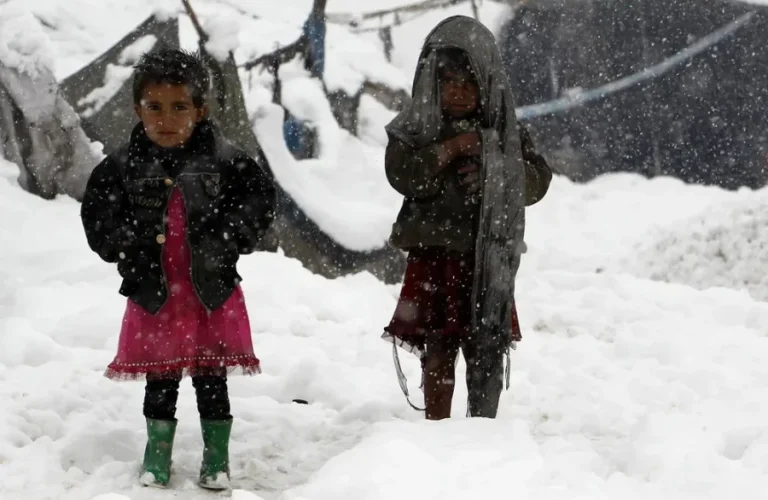 Children in the snow in Afghanistan