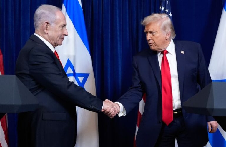 President Donald Trump shakes hands with Israel's Prime Minister Benjamin Netanyahu at the end of a news conference at Mar-a-Lago, Dec. 29, 2025, in Palm Beach, Fla. (AP Photo/Alex Brandon, File)
