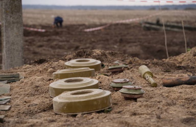 Demining by troops of the territory. Many mines, shells, artillery, grenades, fragmentation grenades