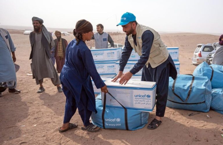 Receiving humanitarian aid in Afghanistan