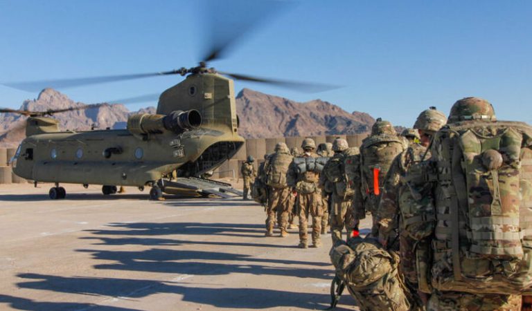 Soldiers attached to the 101st Resolute Support Sustainment Brigade, Iowa National Guard and 10th Mountain, 2-14 Infantry Battalion, load onto a Chinook helicopter to head out on a mission in Afghanistan, January 15, 2019.     1st Lt. Verniccia Ford/U.S. Army/Handout via REUTERS   ATTENTION EDITORS - THIS IMAGE WAS PROVIDED BY A THIRD PARTY. - RC110D3B25B0