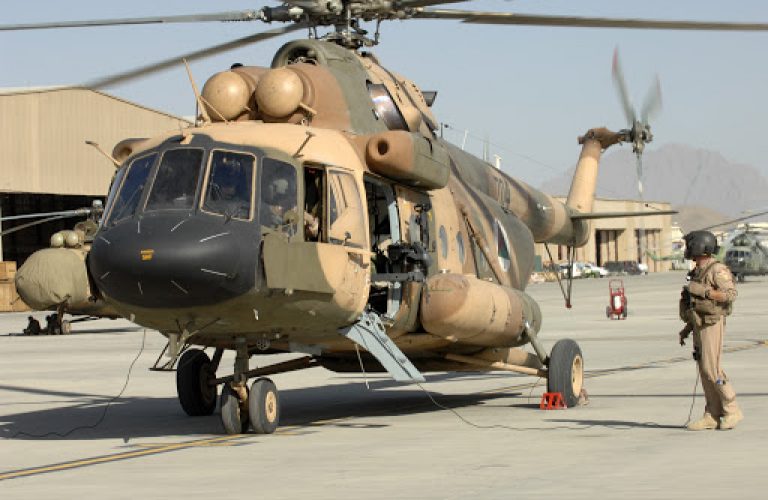 An Afghan Air Force Mi-17 helicopter starts up its engines in preparation for a flight at Kabul International Airport, September 24, 2011.  Coalition Airmen here work daily to set the conditions for a professional, fully independent and operationally-capable AAF. (U.S. Air Force photo by Staff Sergeant Matthew Smith)